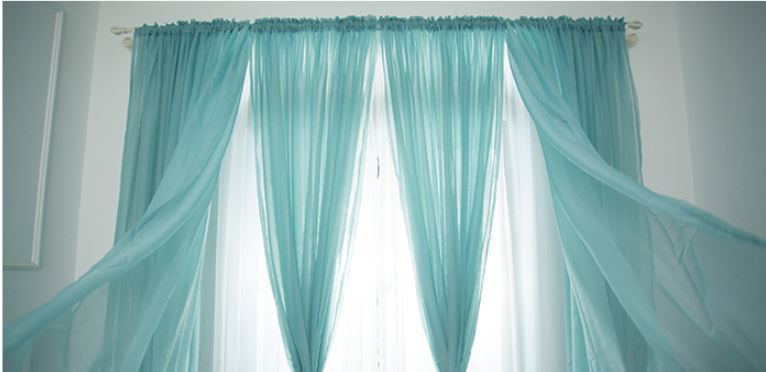 Teal rod pocket curtains in 6 times fullness